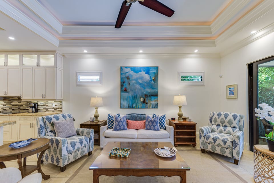 Living Room - Spacious open-concept living room with 60” Smart TV