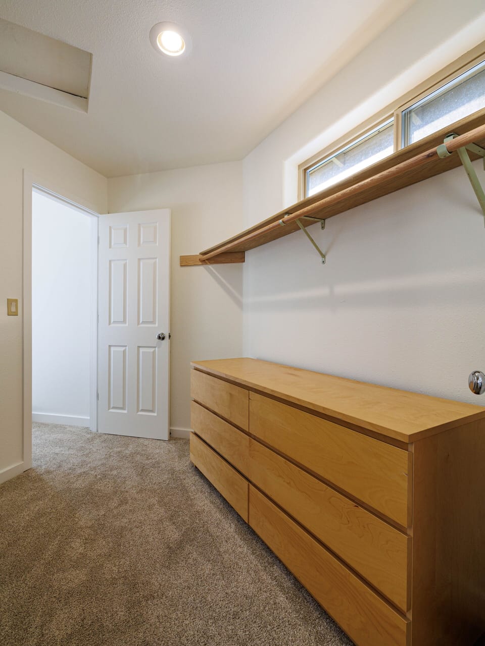 The walk-in closet is big enough for a family of 5