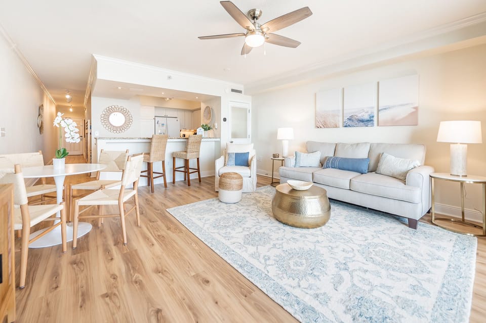 Spacious living room with queen sleeper sofa, 50" smart TV, & view of gulf!