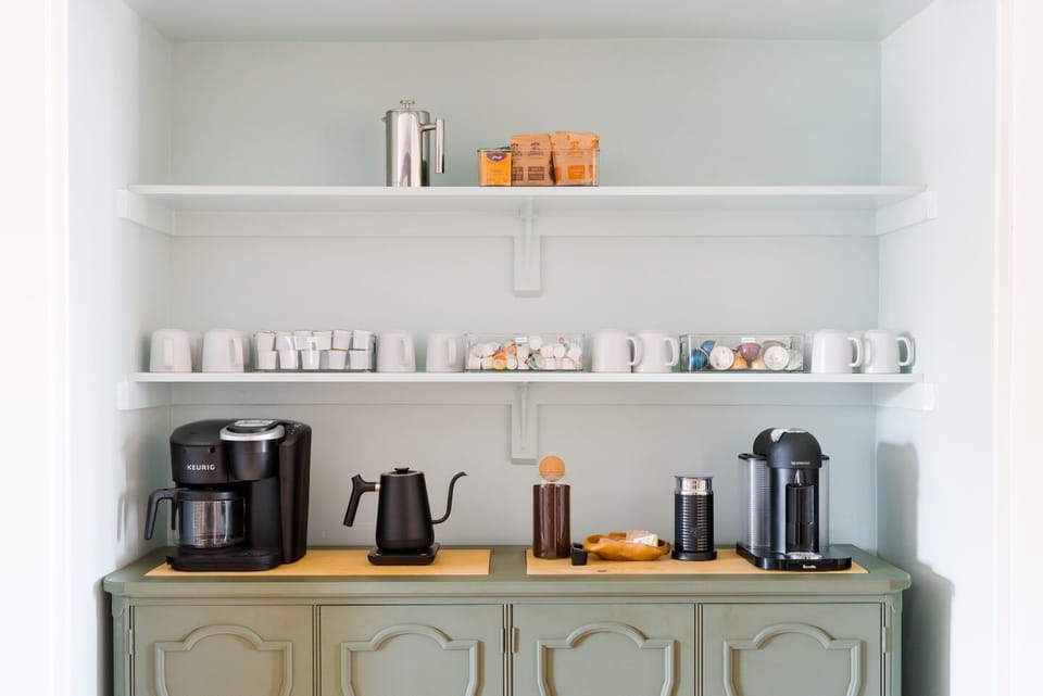 Coffee bar comes with a drip machine, as well as Nespresso.