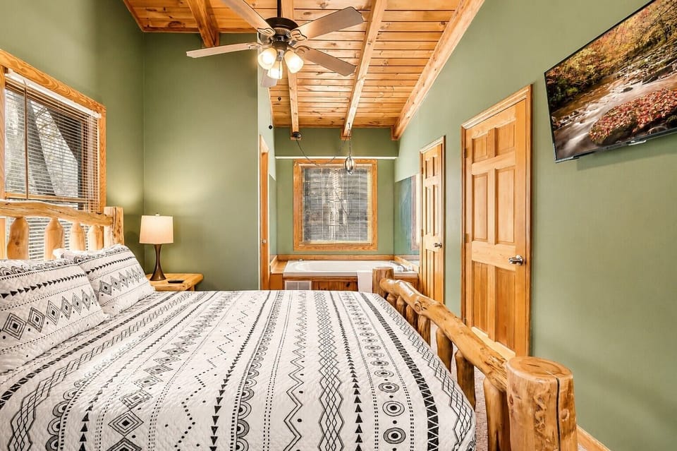 Queen bed with smart TV