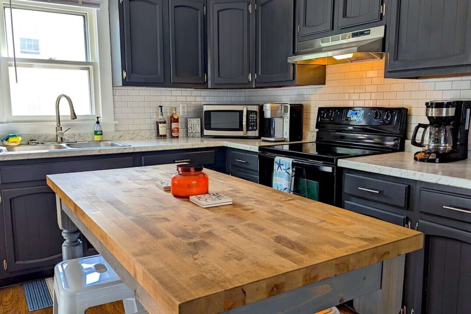 Our favorite place to play games is around the kitchen island.