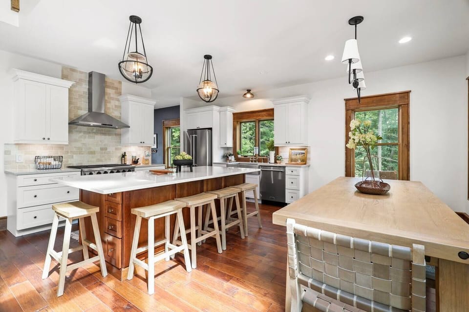 Quartz counters on a 10-foot island provides ample serving space and counter seating for 5. 