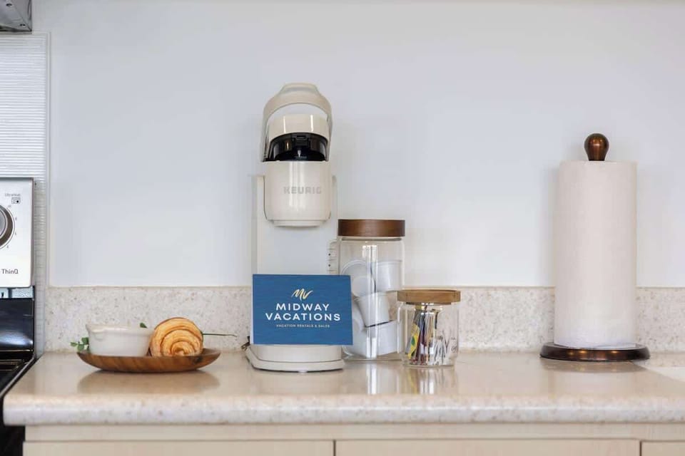 Start your mornings right with a fresh cup of coffee from the Keurig coffee maker provided for your convenience.