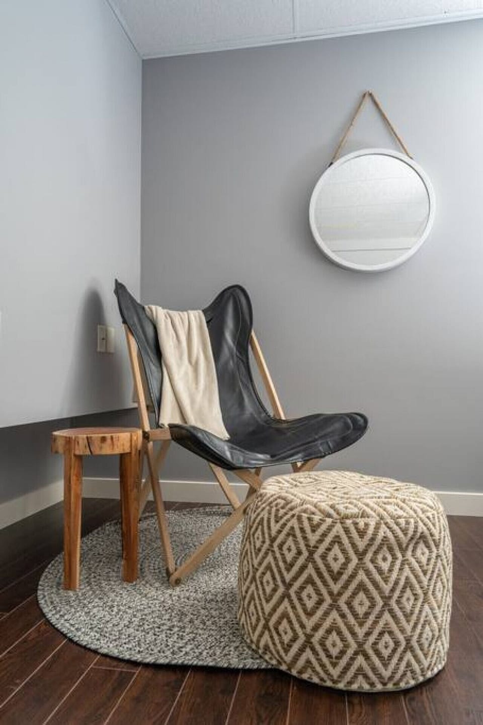 Third bedroom, located downstairs, with a queen bed, a twin bed, and room-darkening shades.