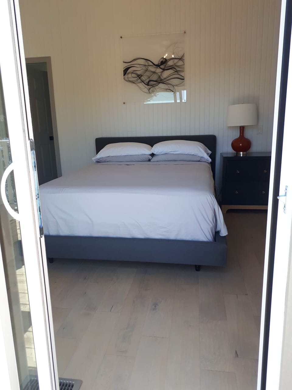 Master bdrm, 2 dble closets, hangers, blinds, ceiling fan, bedding, deck access