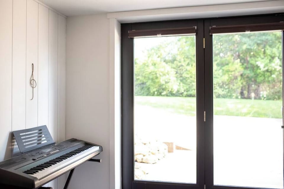 Downstairs walk-out french doors for convenient access to your vehicle.
