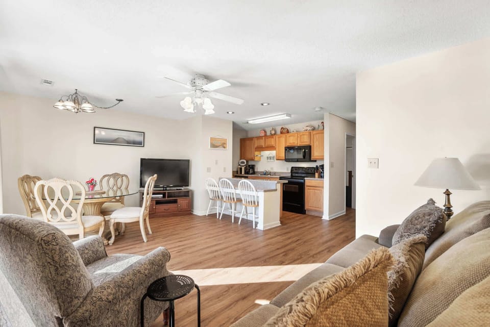 Bar Area with Three Stools for Additional Seating for Meals