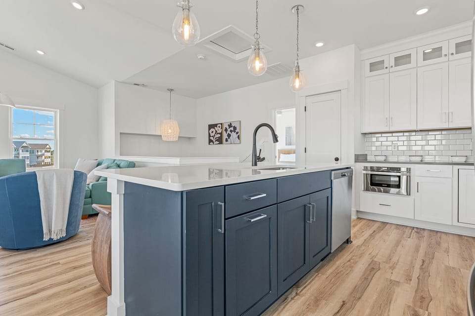 Kitchen with Bar Stool Seating on Third Level