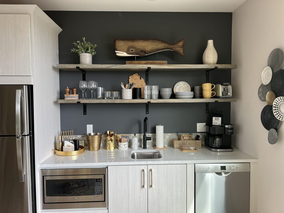Kitchenette-Frig/Freezer w/ice maker, Microwave & Dishwasher (NO Stove)