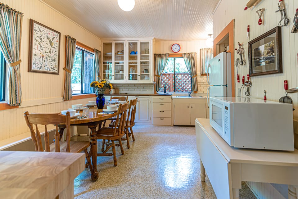 view of kitchen table that can seat 6