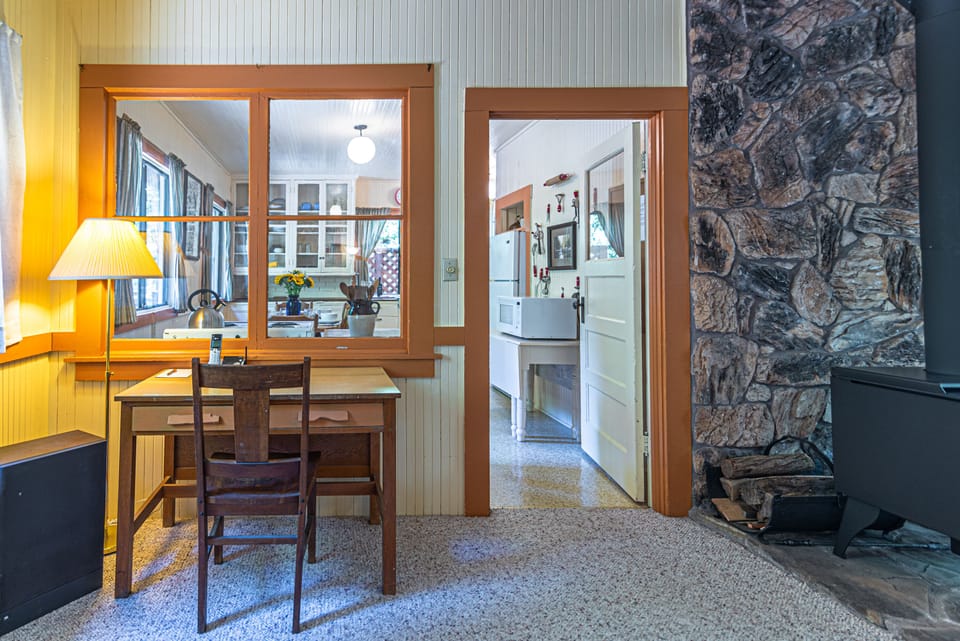 view of desk and entrance to kitchen
