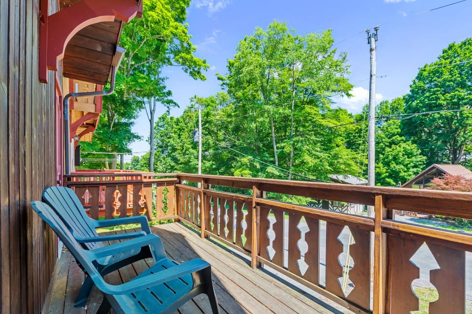 Front deck off the main floor looks out towards a quiet street.