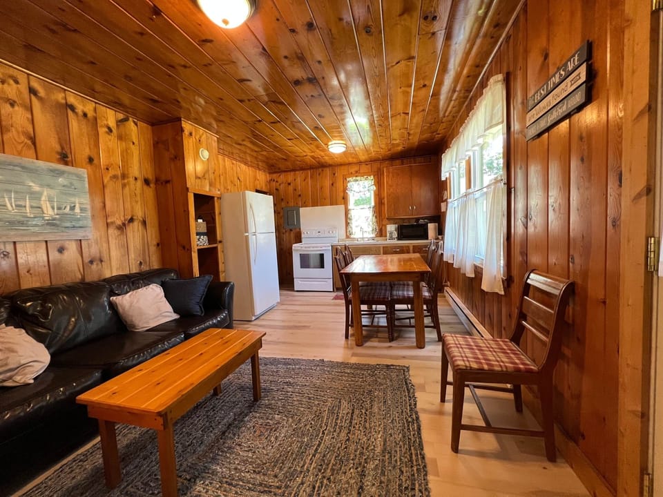 Open living space in No. 8 cabin with new flooring 