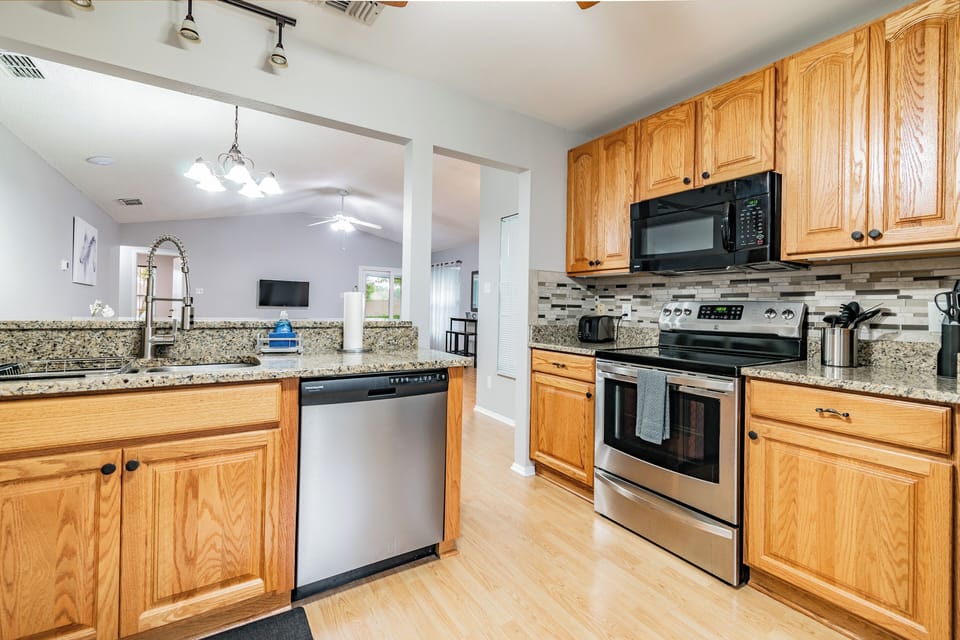 Kitchen Area with Microwave, Stove/Oven and Dishwasher
