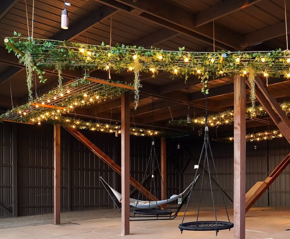 Hammocks and swings to relax on in the covered patio space 