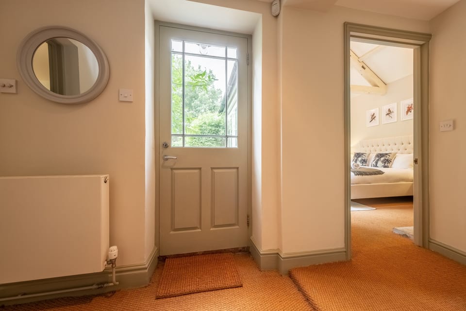 Ground floor: Showing the garden door and through to bedroom five