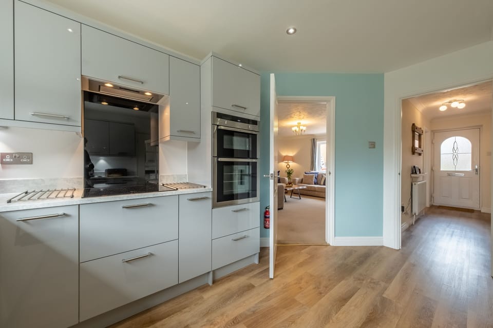 Ground floor: The kitchen is adjacent to the hallway and living area