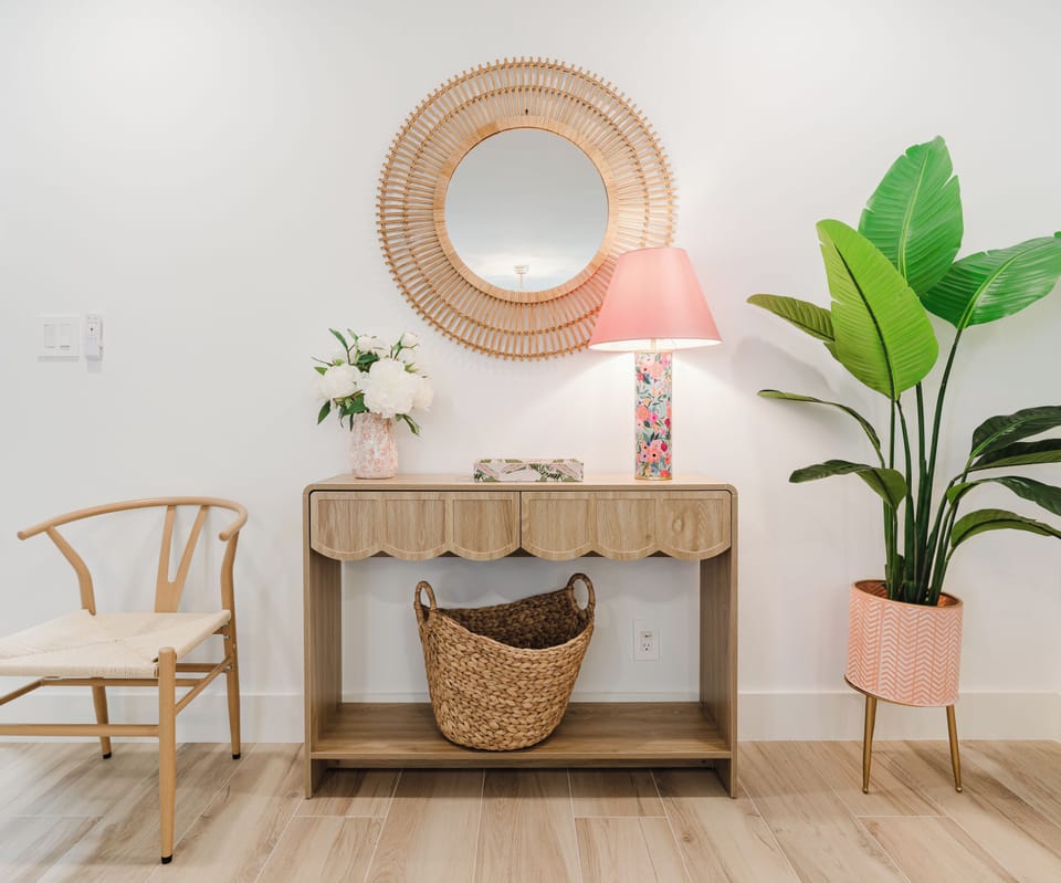 Make yourself at home from the moment you arrive. This welcoming entryway features designer coastal décor, creating the perfect first impression for your South Florida getaway.
