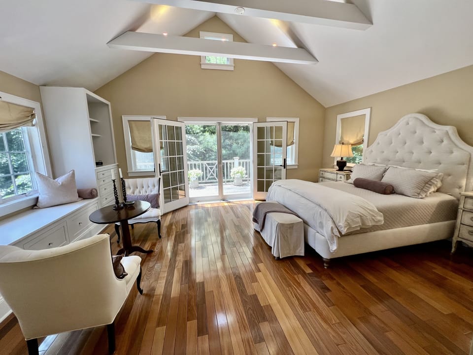 primary bedroom with balcony