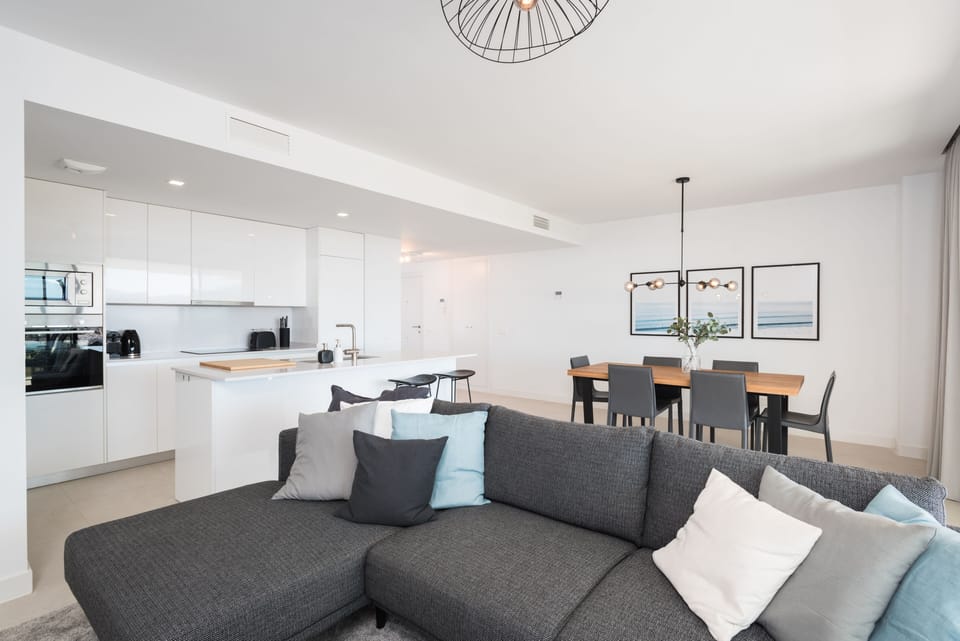 Sofa and the kitchen area to the left