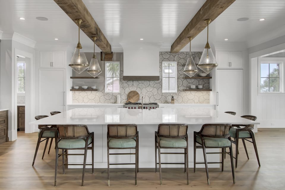 Large center island with barstool seating.