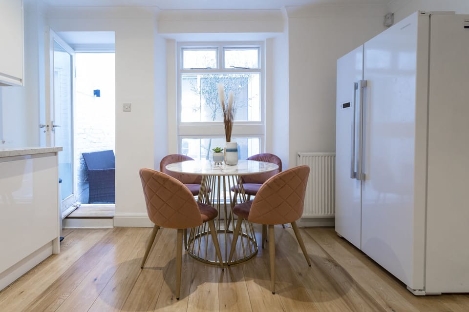 Eat in kitchen with large fridge freezer