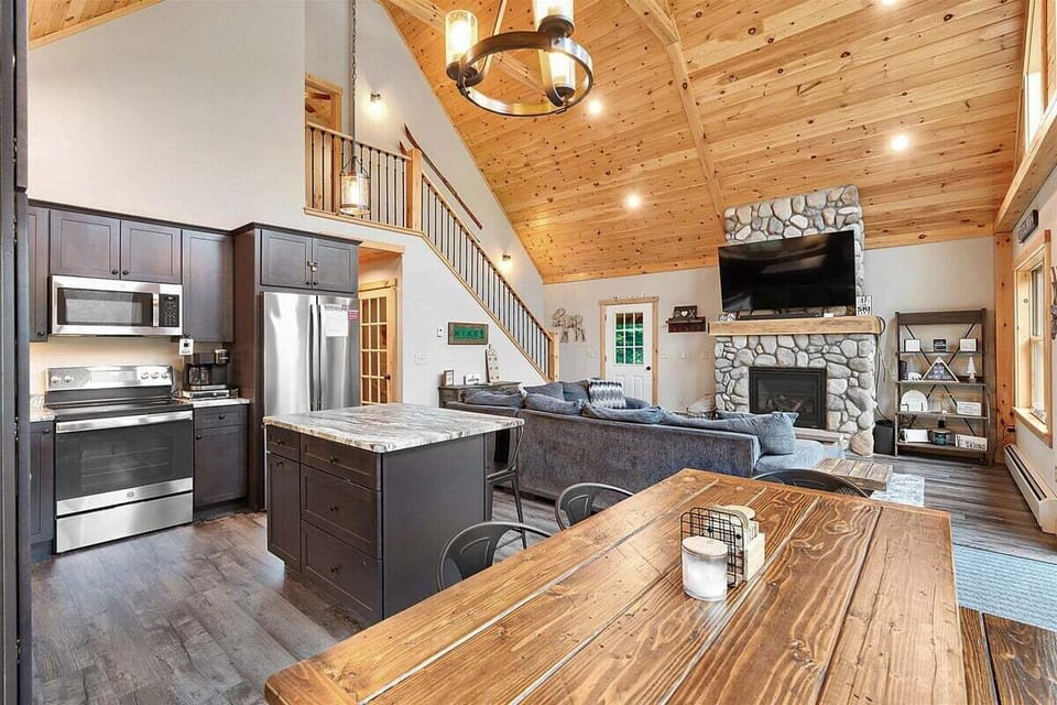 Dining, kitchen, and living area