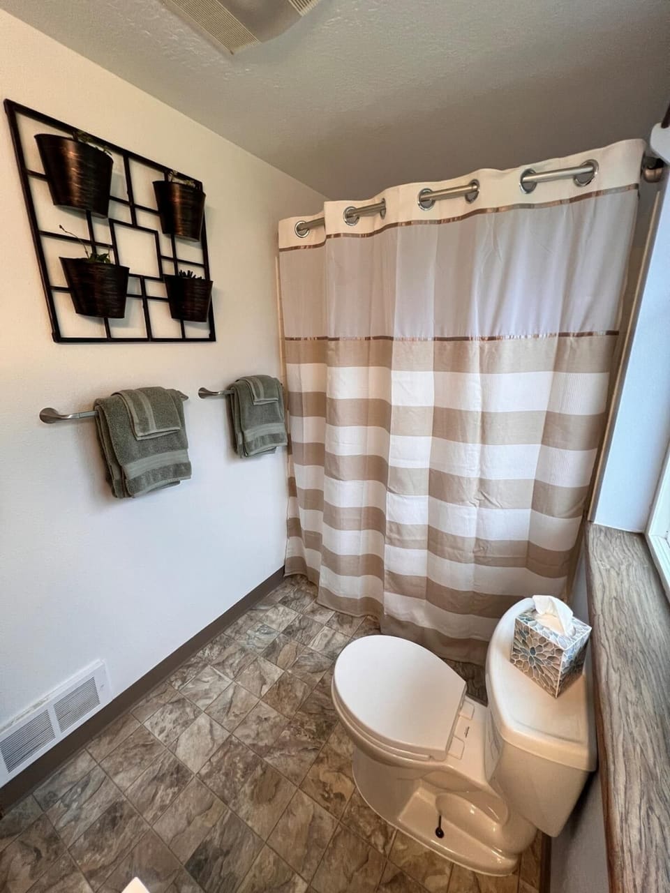 Main Bathroom with full linens, toiletries, and personal items in case you need them. It is on the second floor, near the bedrooms.