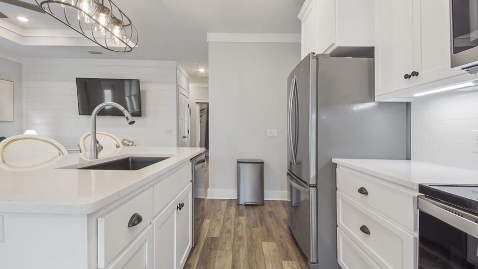 Convenient kitchen with a farmhouse sink.