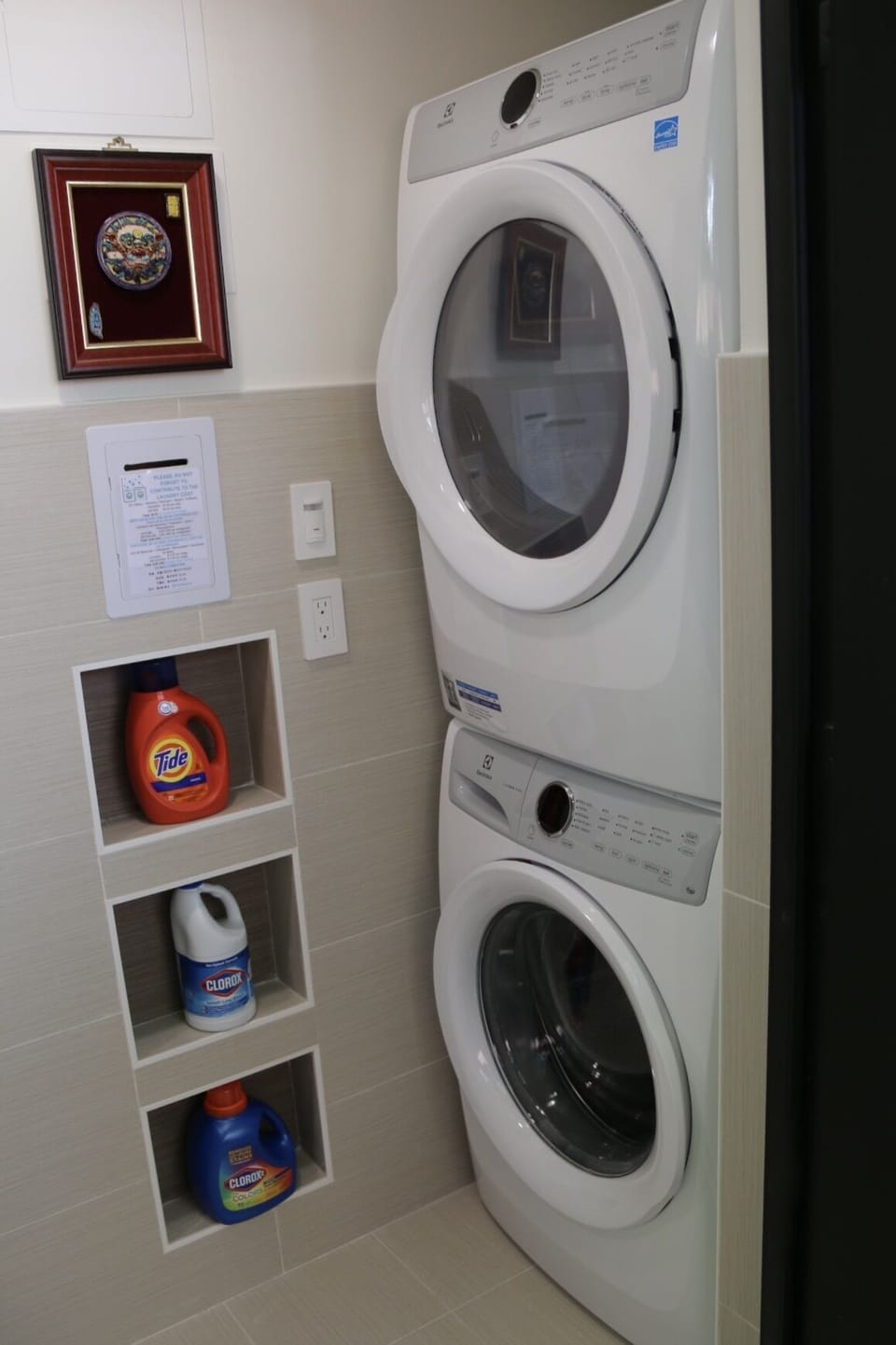 Access to the Laundry Room located on the side of House w/ separate Keypad Lock 