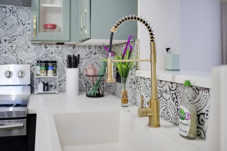 Gold kitchen sink fixture