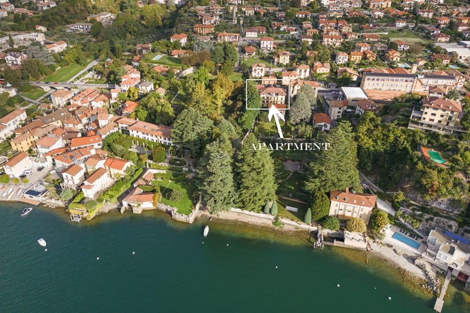 An aerial view of the apartment depicting close proximity to the lake and beach.