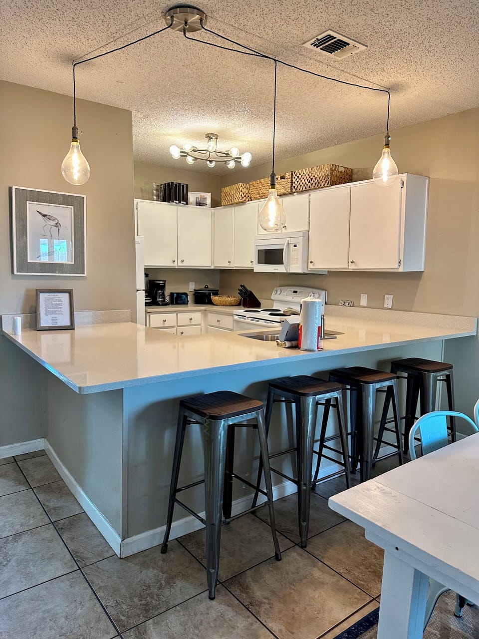 Kitchen with dining at bar