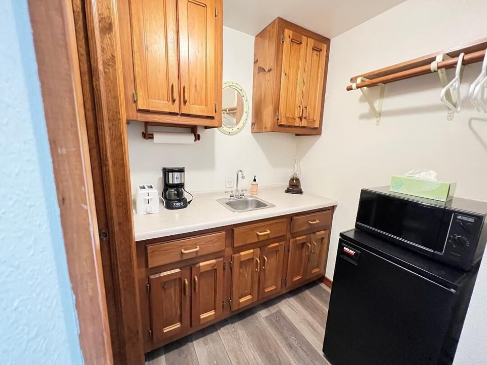 Coffee pot, Keurig, Toaster, Toaster oven, Microwave, Fridge/Freezer combo