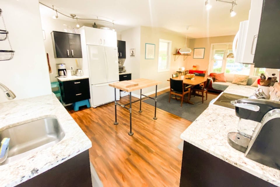 The kitchen opens up to the dining/living room.