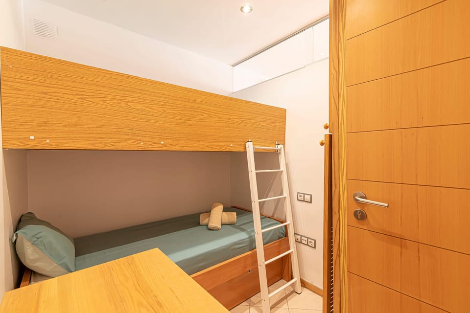 The second bedroom with two beds