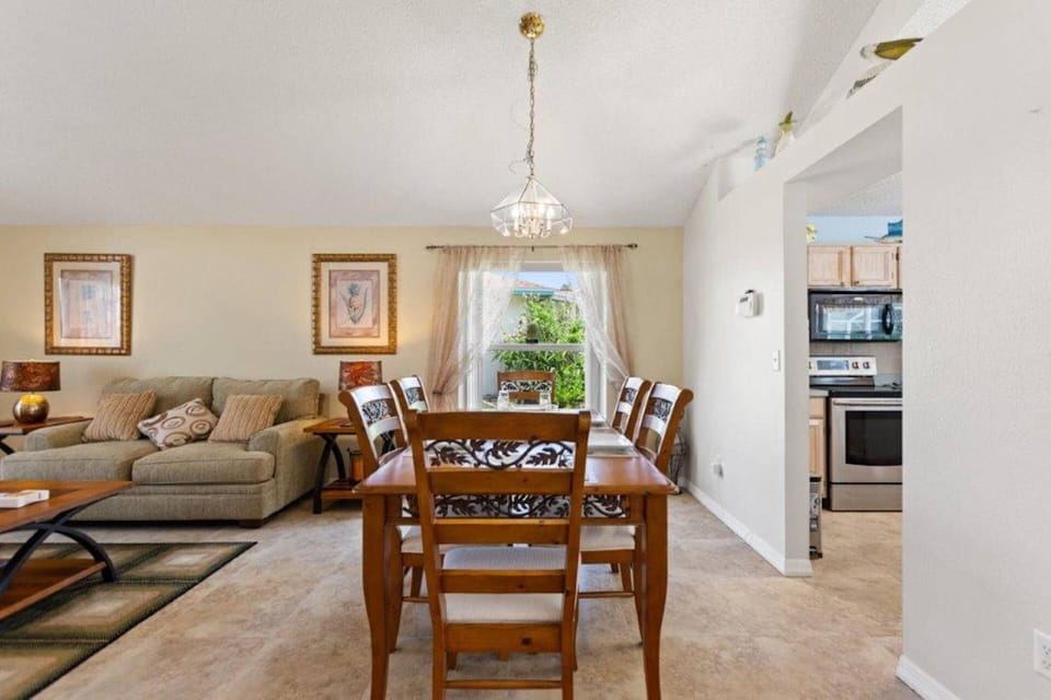 Formal Dining Area For Six (6) Guests and Access to Kitchen Area
