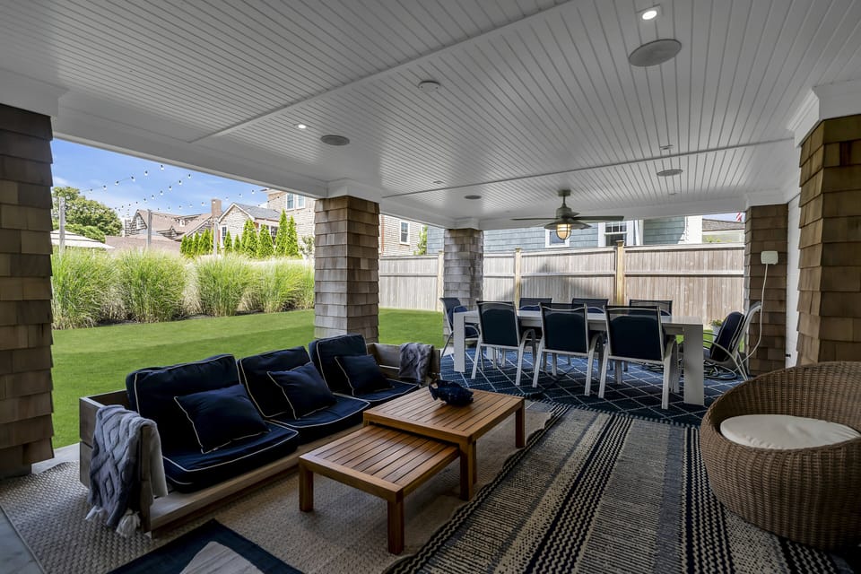 Outdoor Patio adjacent to the Fenced-in Yard and Gym