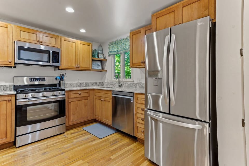 Kitchen off the first living room and dining room.