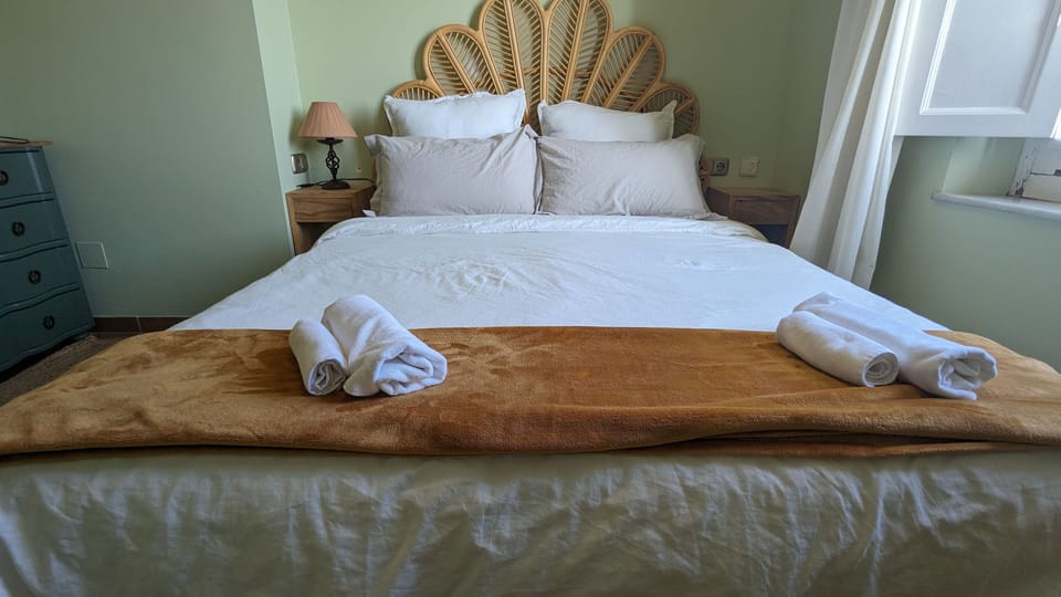 This comfy room features a double bed.