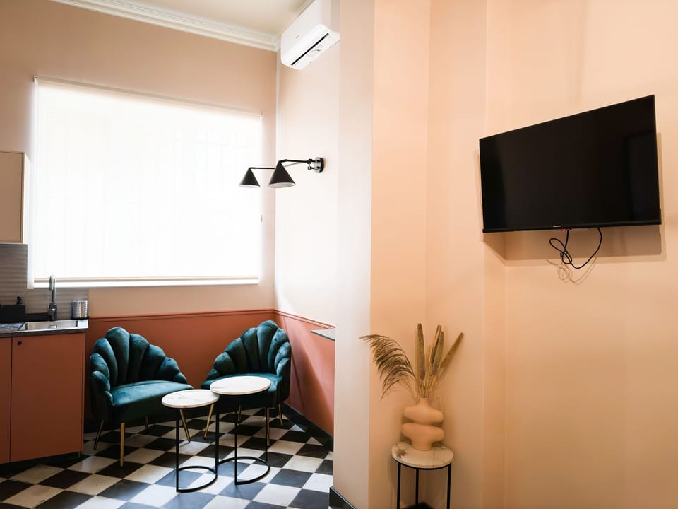 Another angle of the kitchenette showing its modern aesthetic, perfect for enjoying a morning coffee before exploring the city.