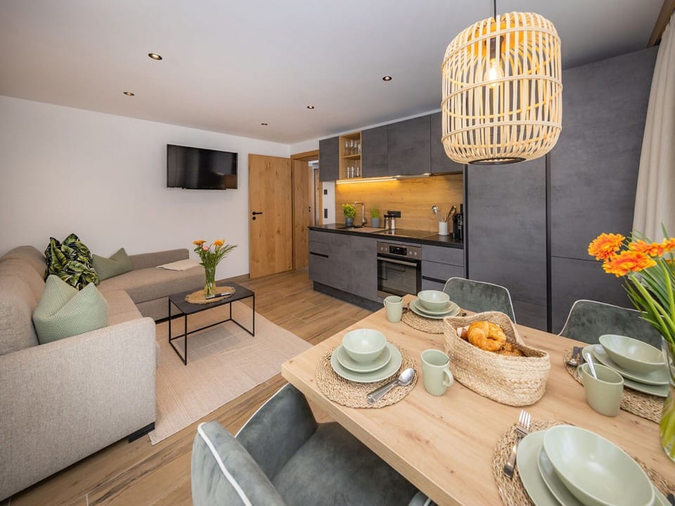 Table, Furniture, Property, Couch, Tableware, Orange, Interior Design, Lighting, Countertop, Plant