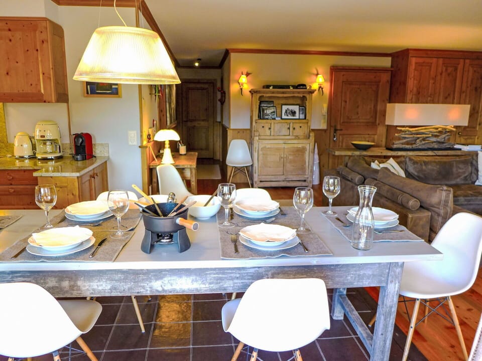 Table, Furniture, Property, Countertop, Dishware, Picture Frame, Kitchen, Chair, Wood, Lighting