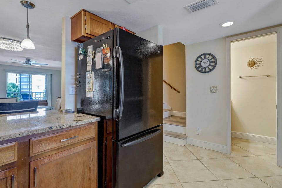 Steps off the entry hallway lead to the bedrooms on the 2nd floor.