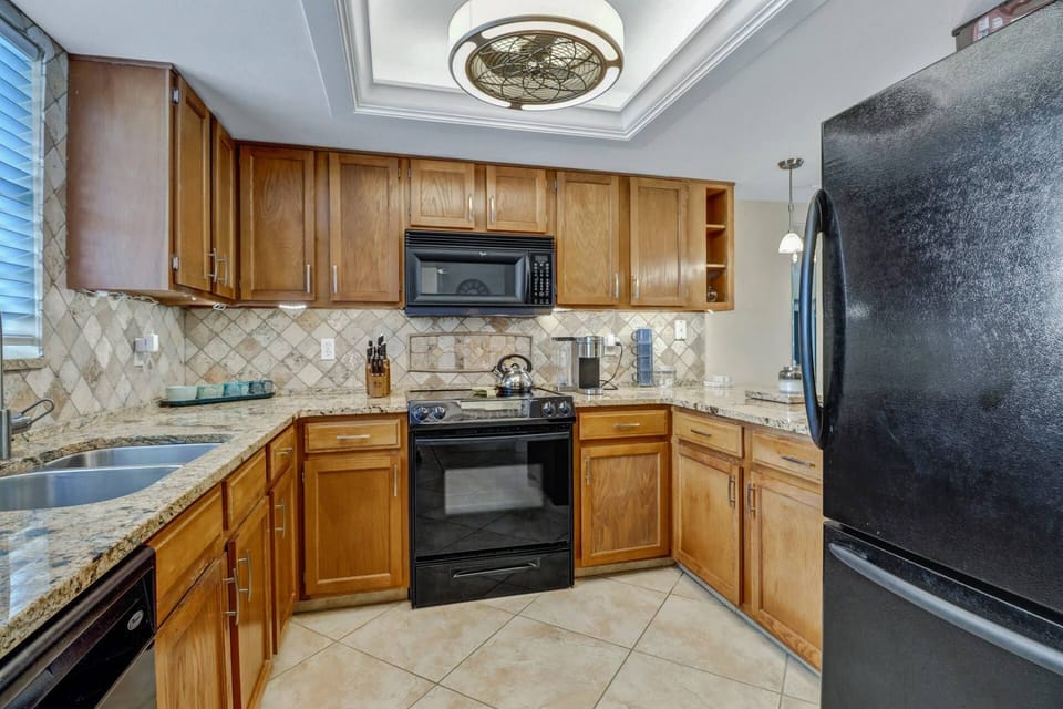 The full kitchen is well equipped with full size oven, dishwasher, refridgerator/freezer and microwave.
