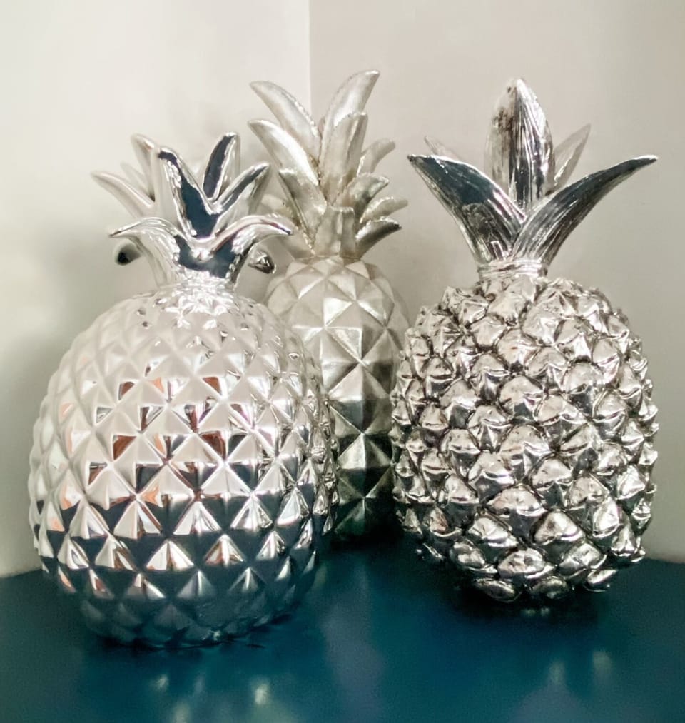 A set of Urban Pineapples add some fun decor. 