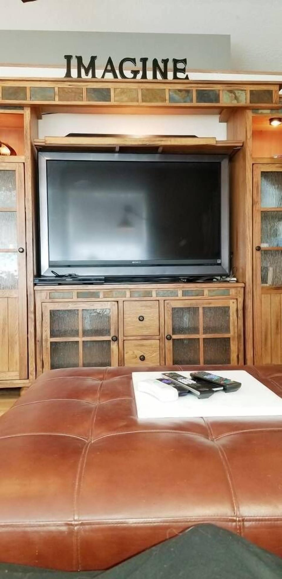 Includes Large LCD TV w/ Roku SmartTV options. Enjoy my HULU, Netflixs, & Sirius Apps. *TV does take a few minutes to warm up but it is 100% nicer than the LG SmartTV I bought to replace it. Was 3K at Costco a few years ago. New Bluetooth Sound Bar.