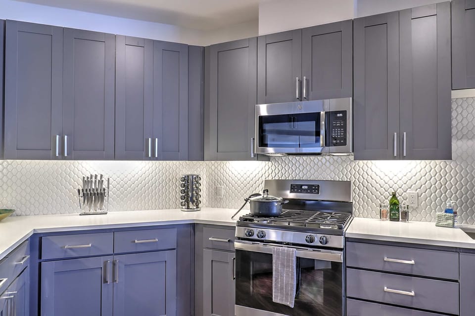 Prepare meals with ease in the fully equipped kitchen stocked with modern appliances and cooking essentials.