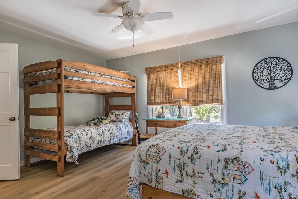 Back bedroom with queen and bunk beds